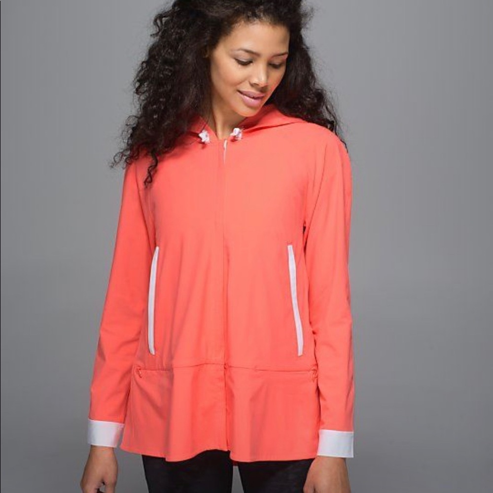 Lululemon Sun Showers Jacket, size 8. Grapefruit.